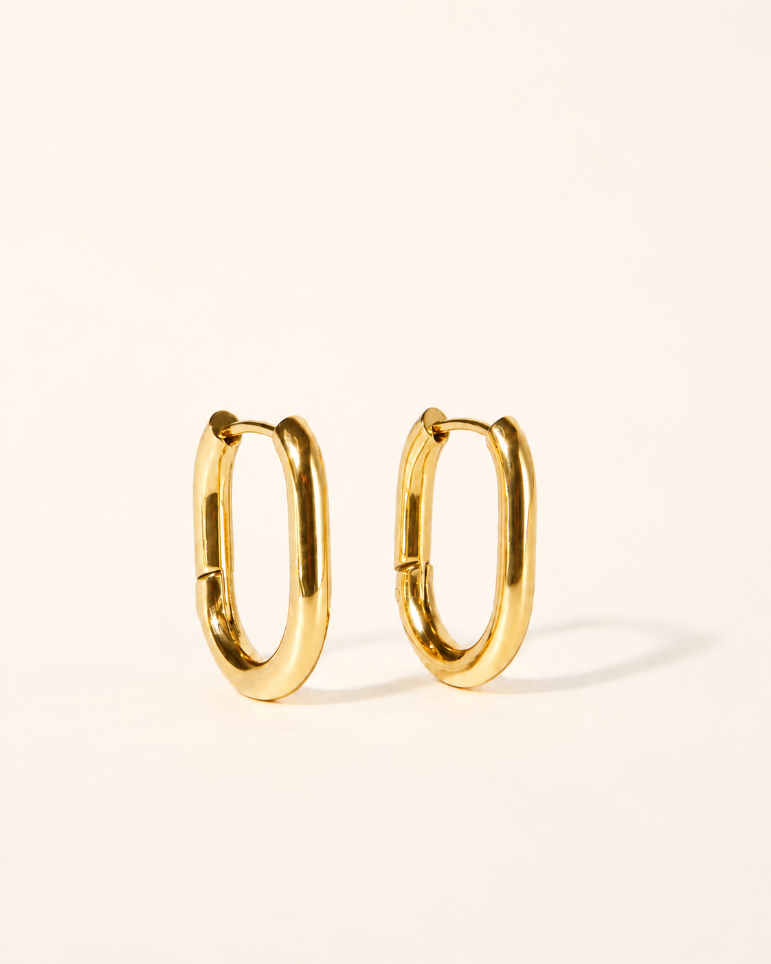 Oh So Heidi waterproof gold Everyday Hoops worn on ear