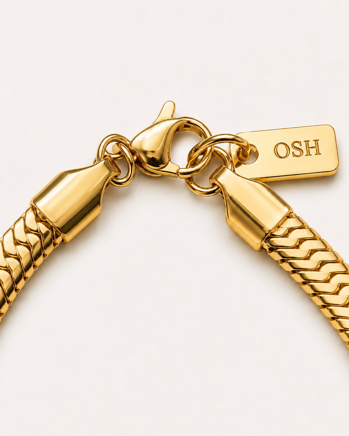 Wave Line Necklace clasp and OSH tag close-up.