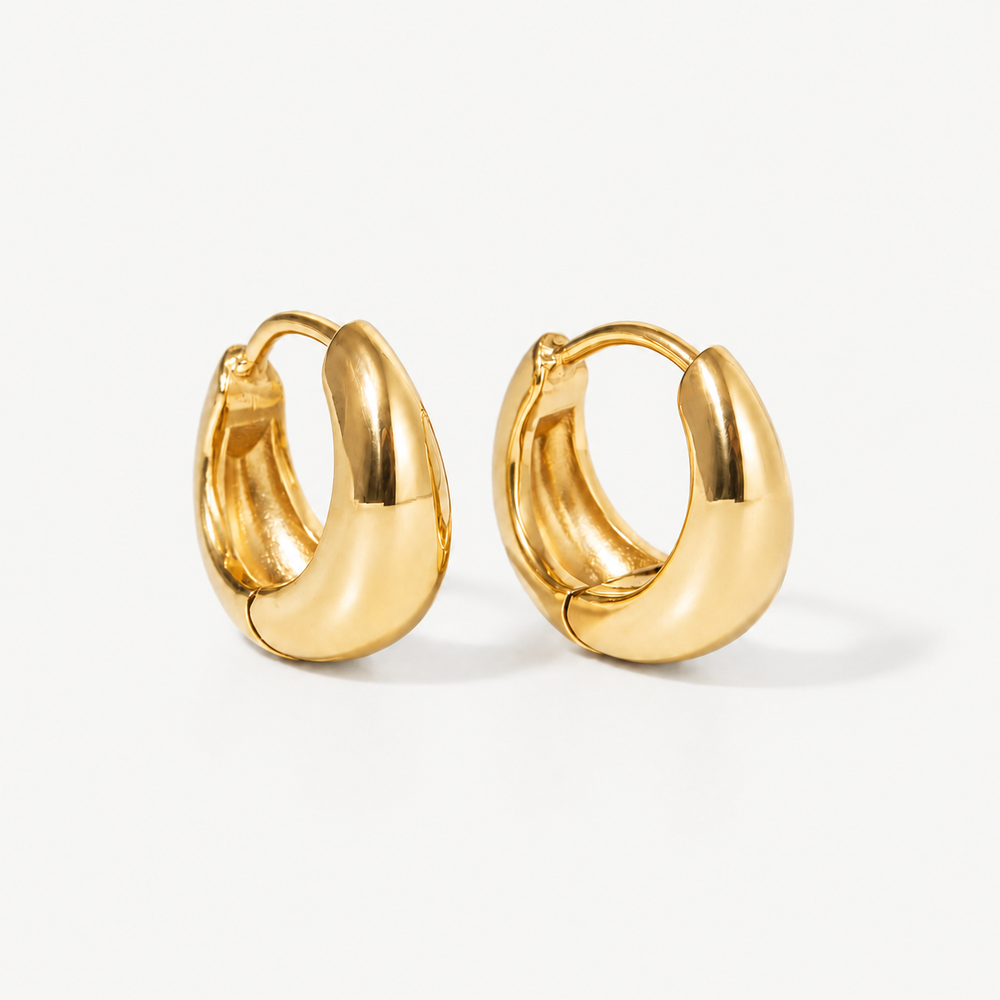 Bold Huggies hoops on a light grey background