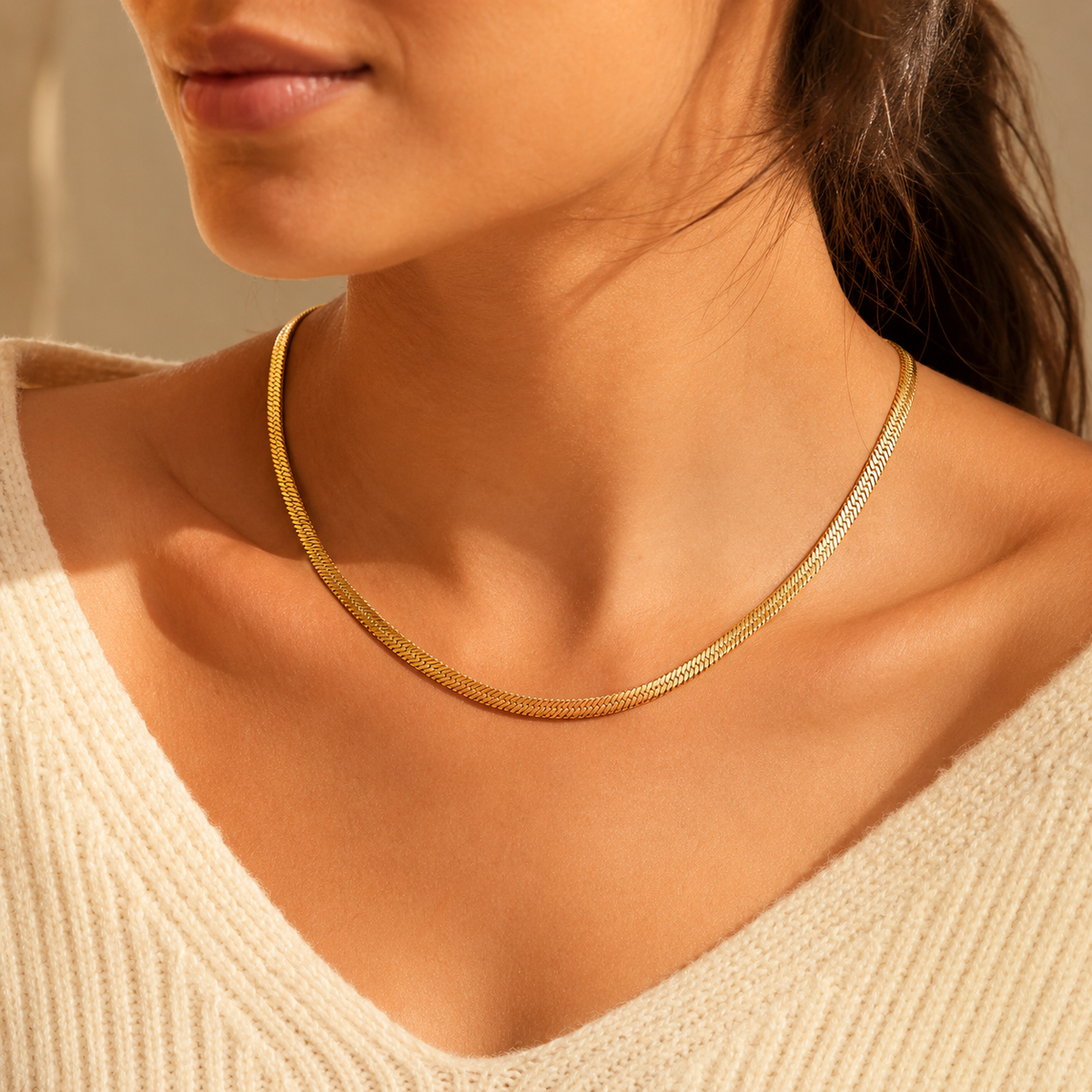 Wave Line Necklace worn by a model with a cream knit top.