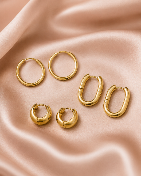 The Everyday Hoops Bundle styled on soft blush satin.