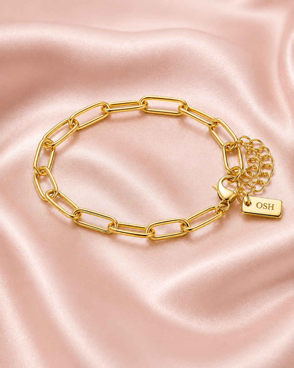 Soft Link Bracelet styled on soft blush satin.