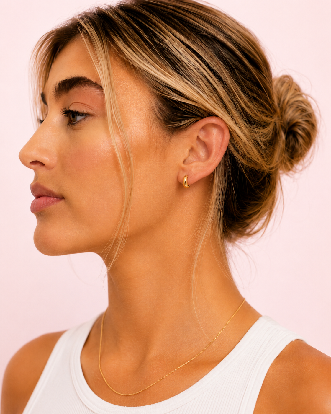 Bold Hoops worn on ear in side profile.