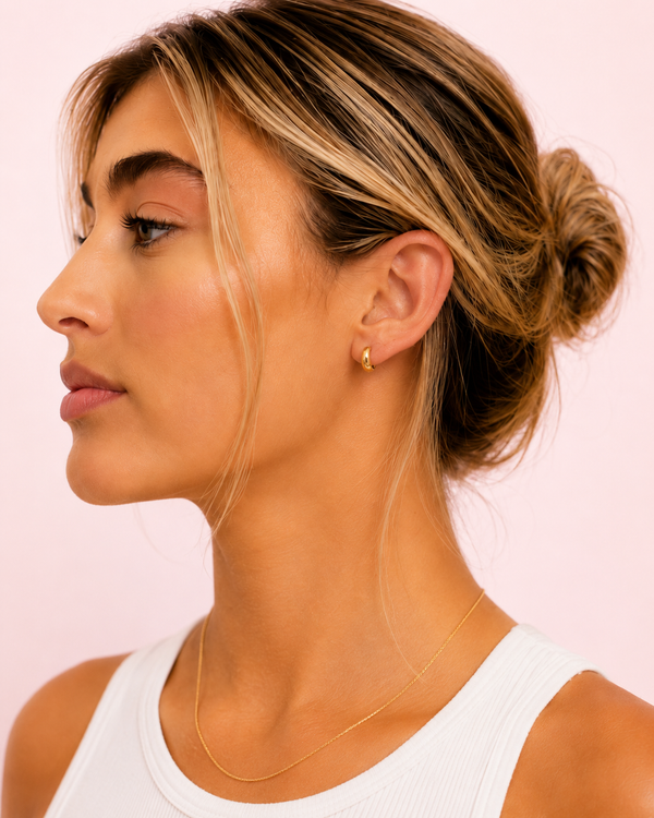 Bold Hoops worn on ear in side profile.